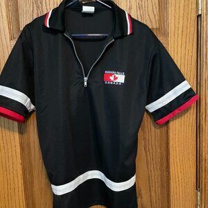 Fabrik shirt Made in Canada. Nice polyester petite Size small.